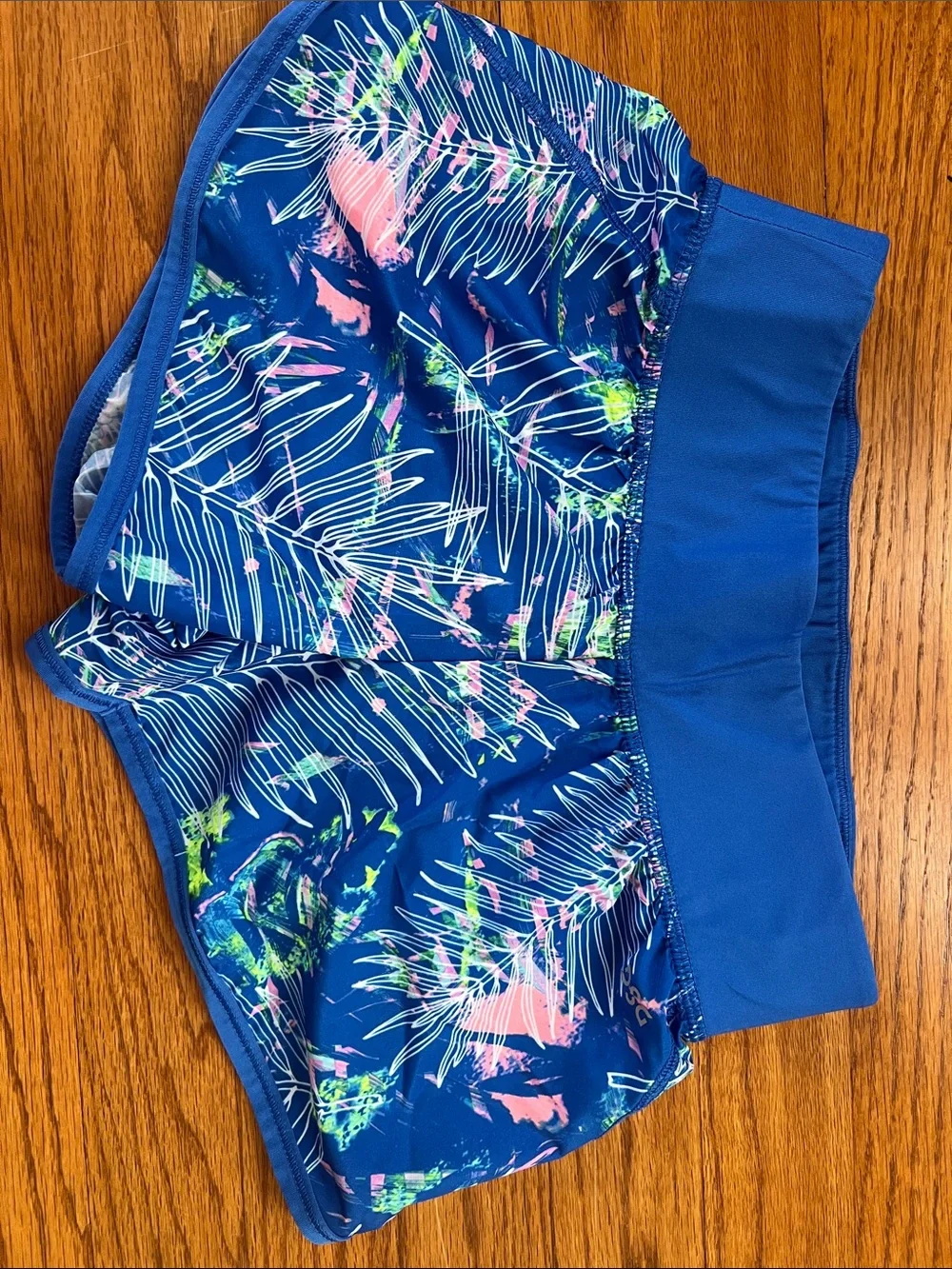 2-pack girls size small athletic shorts. 1. DSG blue pattern, 2. Oshkosh pink